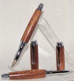 Omega fountain and rollerball African Utile.jpg