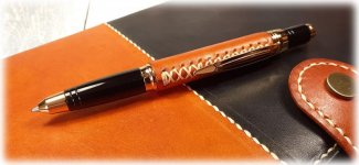 Handmade black and tan leather pen and notebook set.jpg